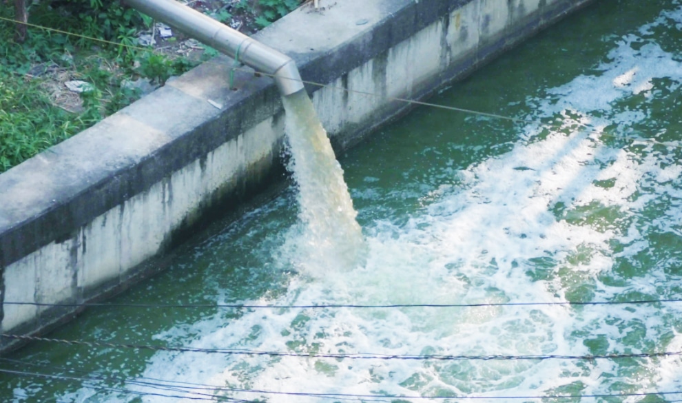 An industrial effluent outlet in a park