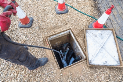 domestic sewage drain through open inspection chamber